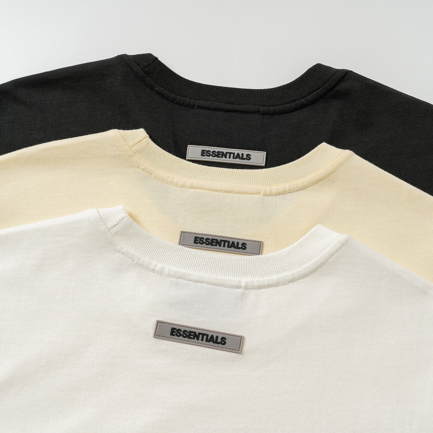 AMBERELLE Core Silicone Label Oversized T-Shirt in cream