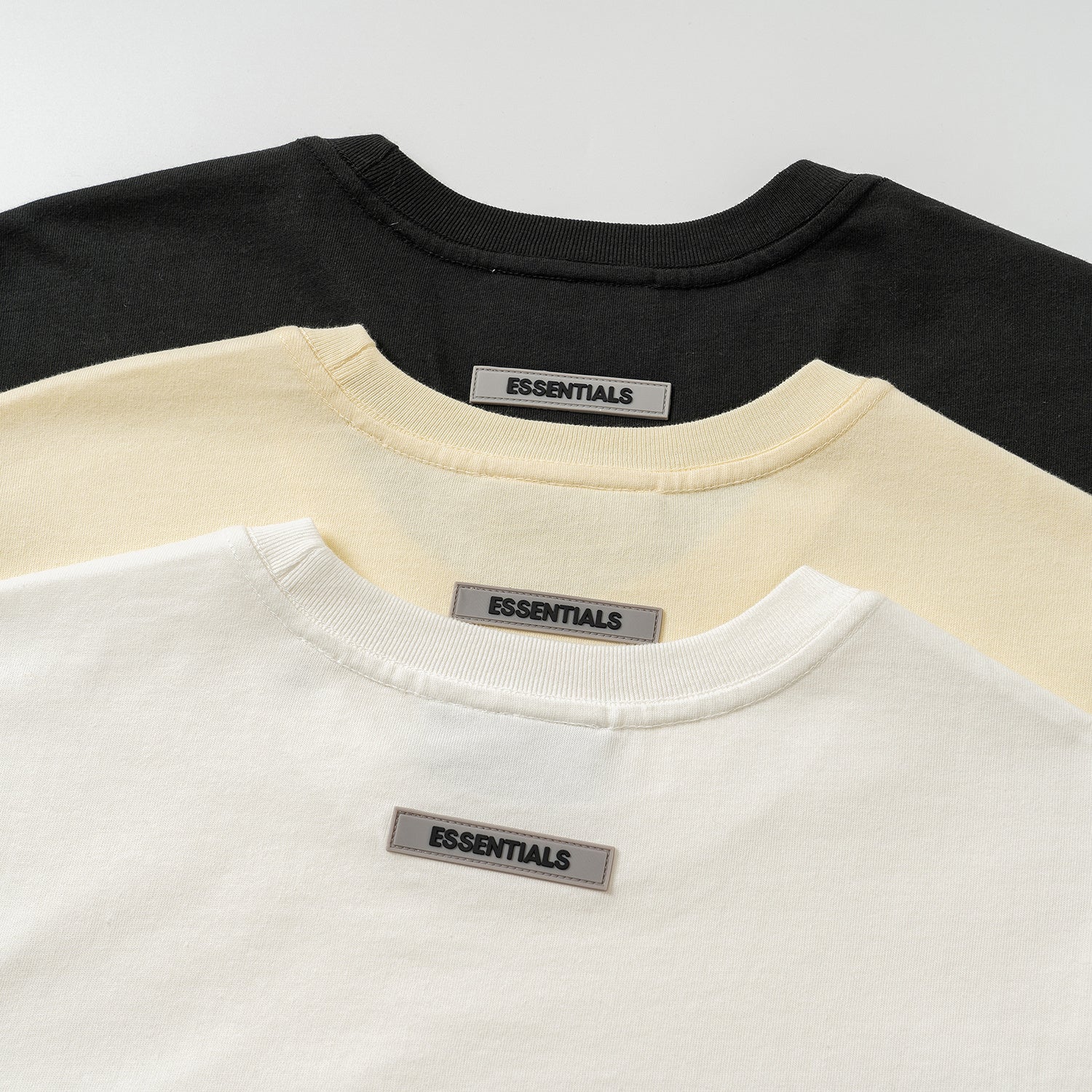 AMBERELLE Core Silicone Label Oversized T-Shirt in cream