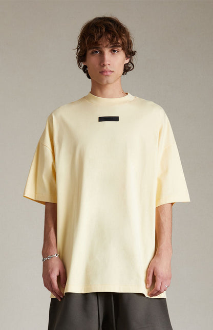 AMBERELLE Silicone Patch Short Sleeve Tee in light heather grey