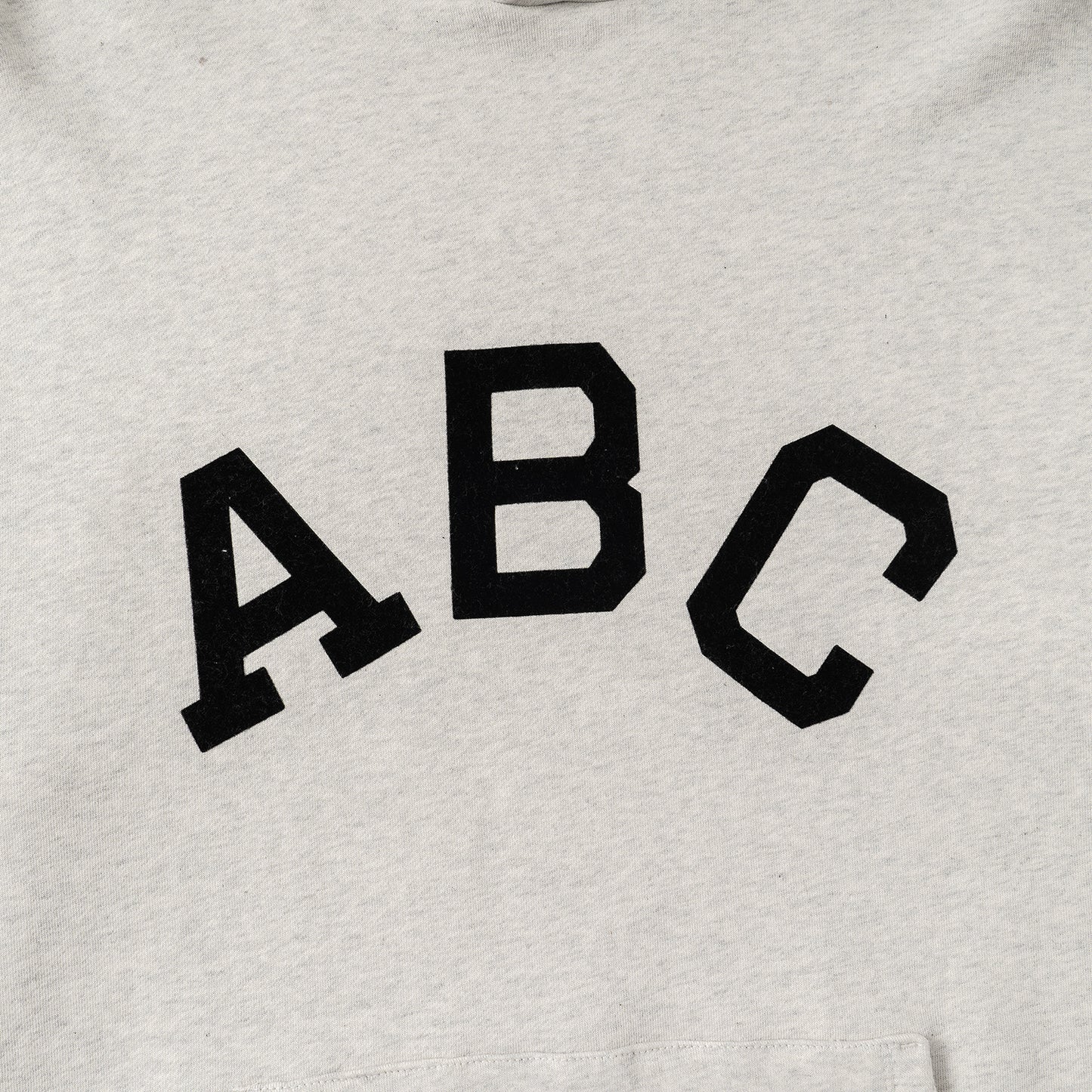 AMBERELLE Varsity Letter Graphic Hoodie in black
