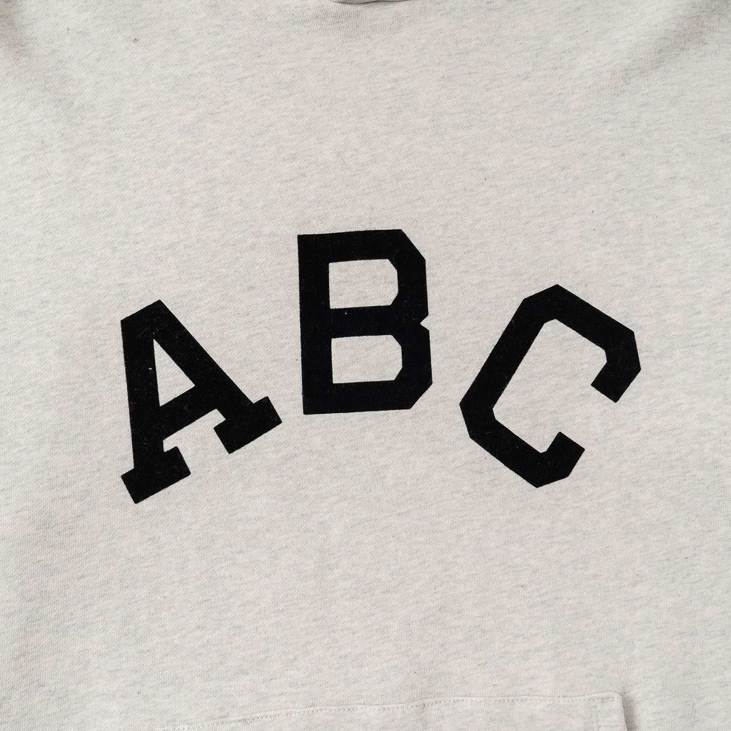 AMBERELLE Varsity Letter Graphic Hoodie in black