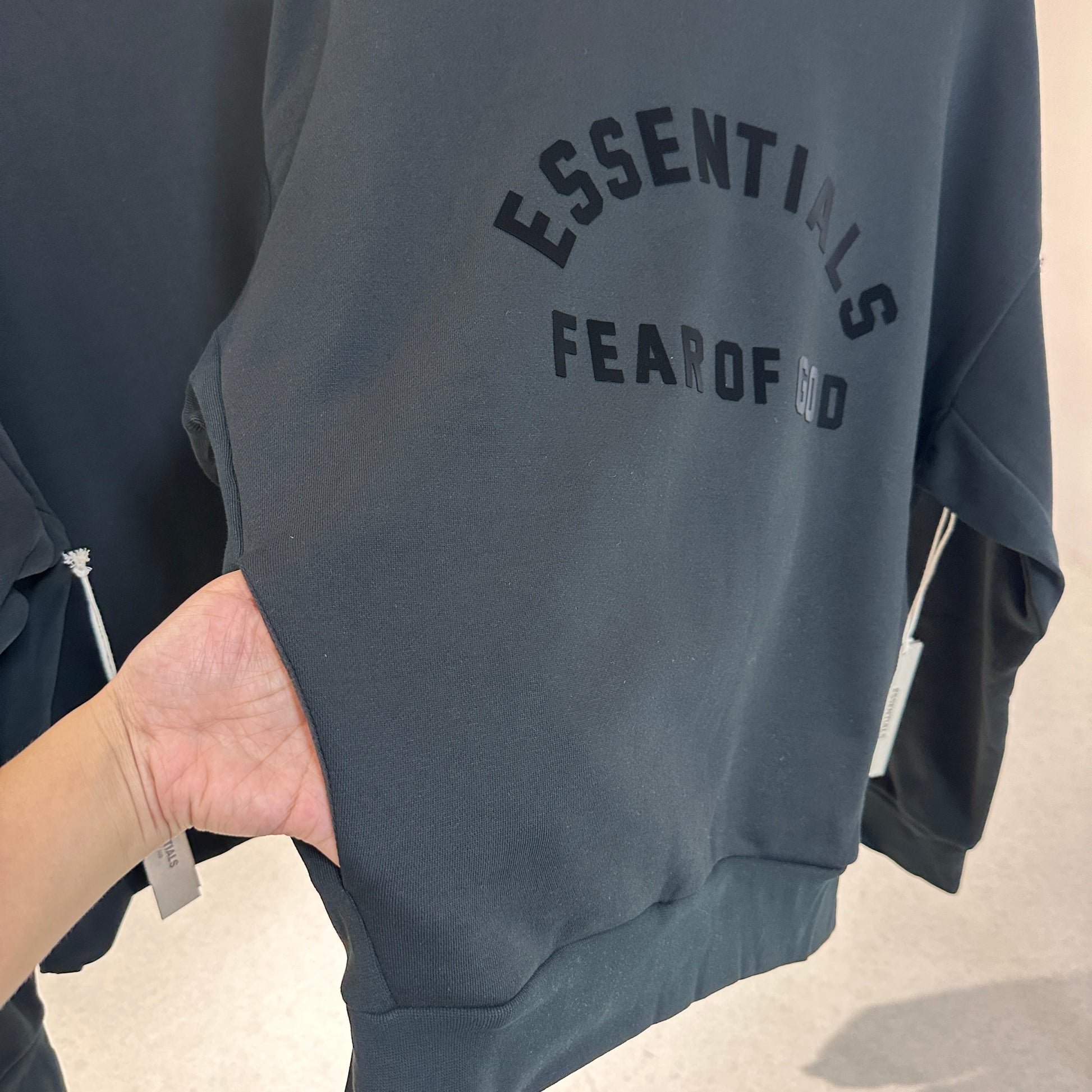 AMBERELLE Arc Logo Flocked Mock Neck Sweatshirt in light heather grey