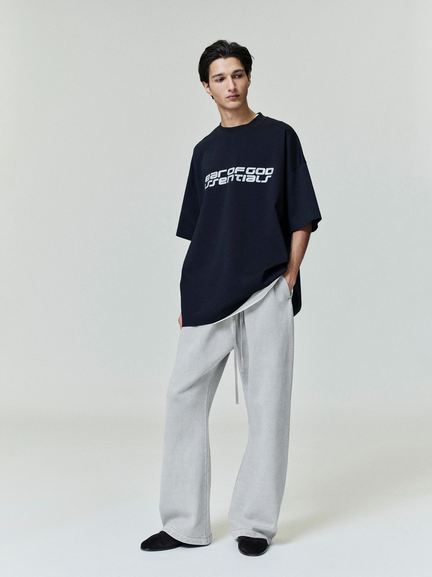 AMBERELLE Racing Logo Boxy T-Shirt in black