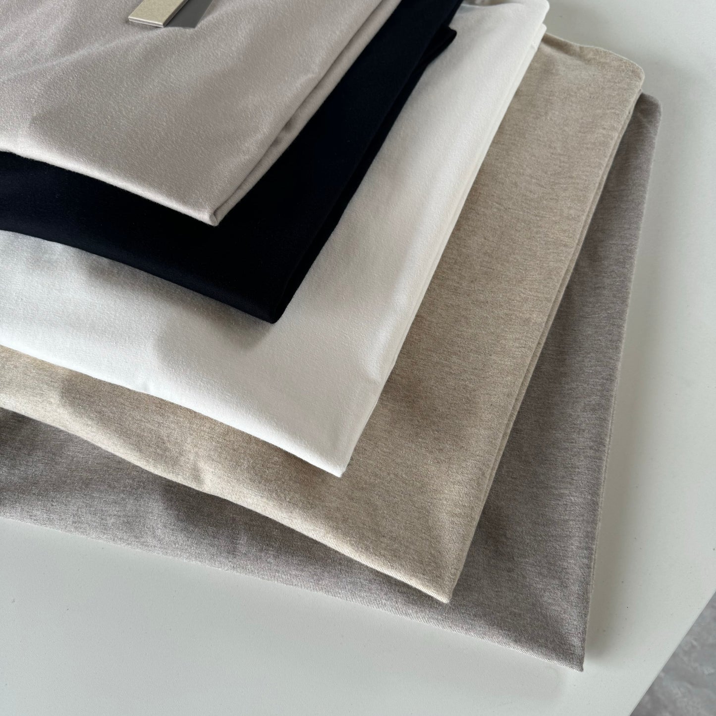 AMBERELLE Cloud Soft Minimal Logo Short Sleeve Tee in cream