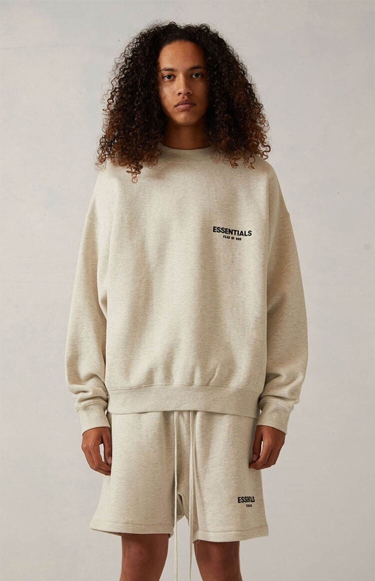 AMBERELLE Back Logo Long Sleeve Sweatshirt in beige