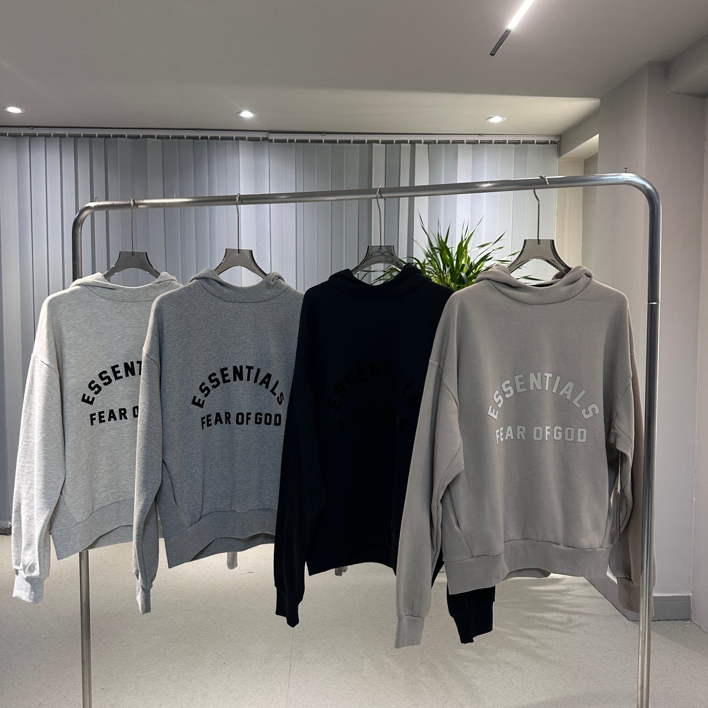 AMBERELLE Season 10 Arch Logo Fleece Hoodie in cream
