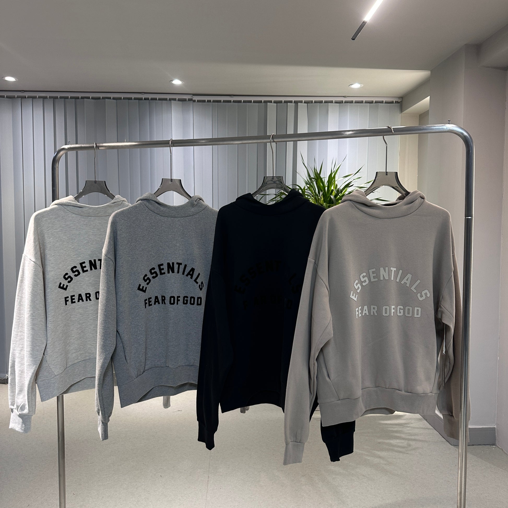 AMBERELLE Season 10 Arch Logo Fleece Hoodie in cream