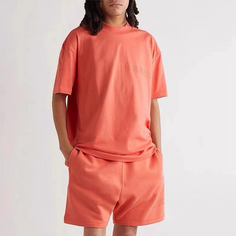AMBERELLE Tonal Flocked Logo Short Sleeve Tee in light heather grey