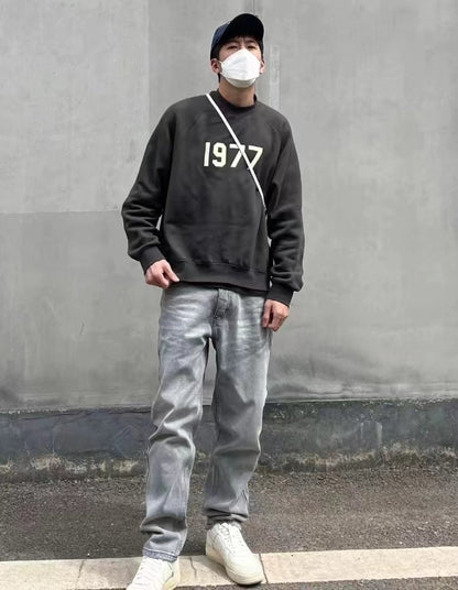 AMBERELLE 1977 Graphic Crewneck Sweatshirt in cream